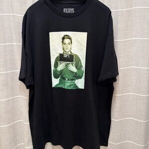 PELVIS Black Short-Sleeve Tee with Green Mugshot Graphic